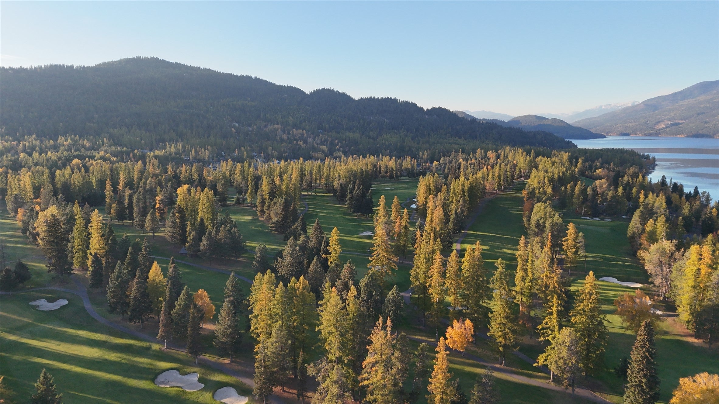 717 Icehouse Road Whitefish, MT 59937 - Photo 30 of 31 Bird's eye view of a water and mountain view and a golf club