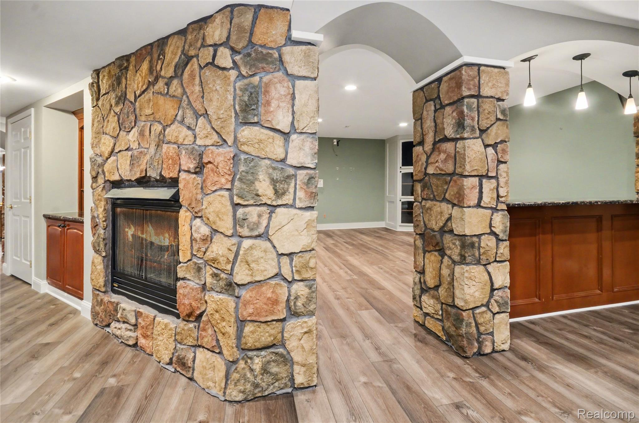 4179 St Andrews Street Howell, MI 48843 - Photo 47 of 75 Enjoy the basement fireplace.
