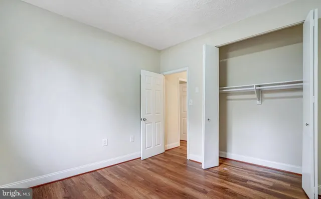 a bathroom with a sink a mirror and vanity