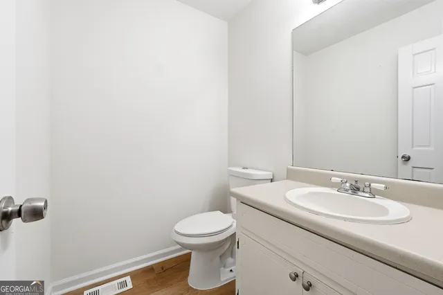 a bathroom with a sink and a toilet