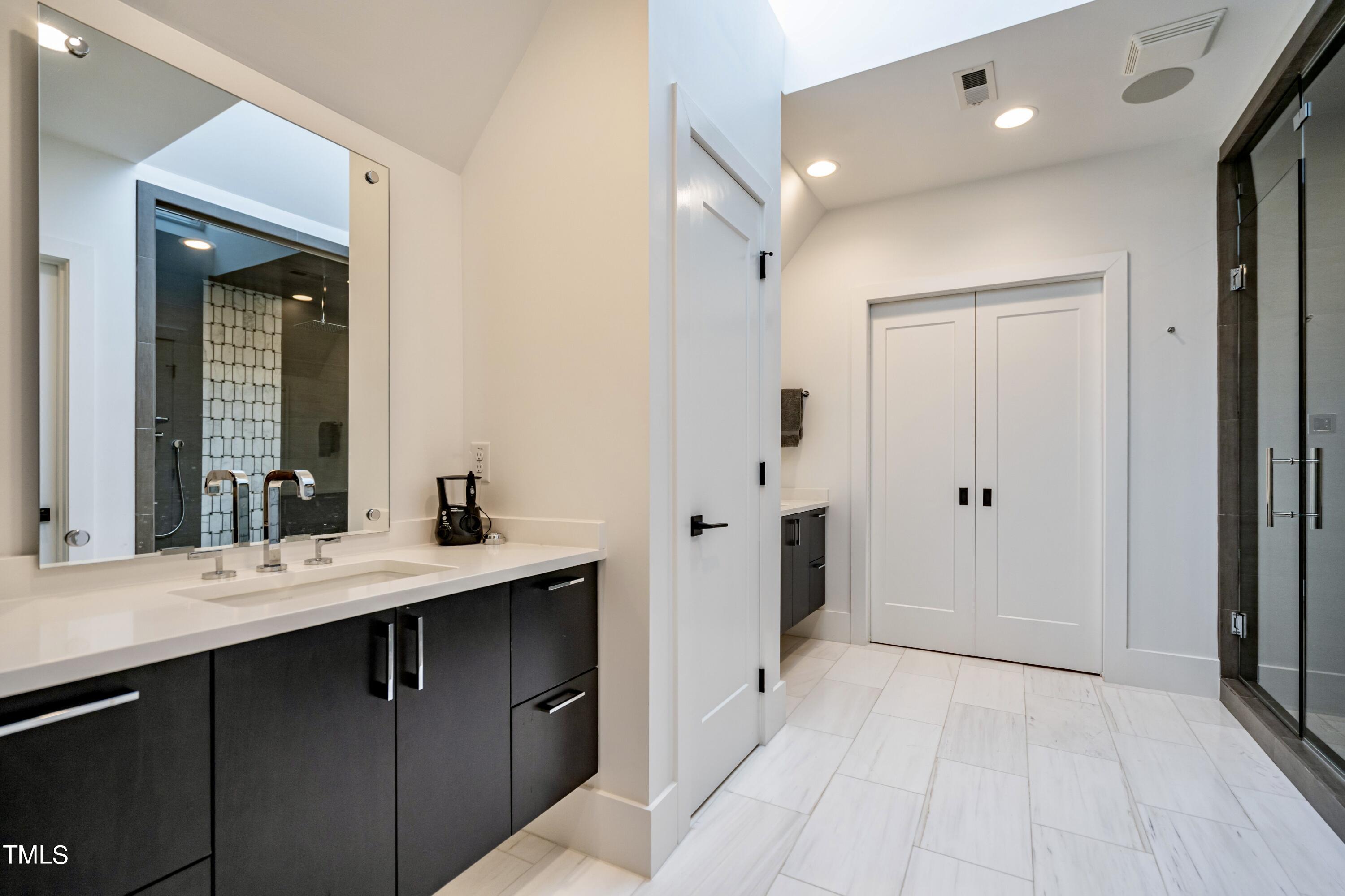 2009 Alexander Road Raleigh, NC 27608 - Photo 28 of 42 With heated marble floors.