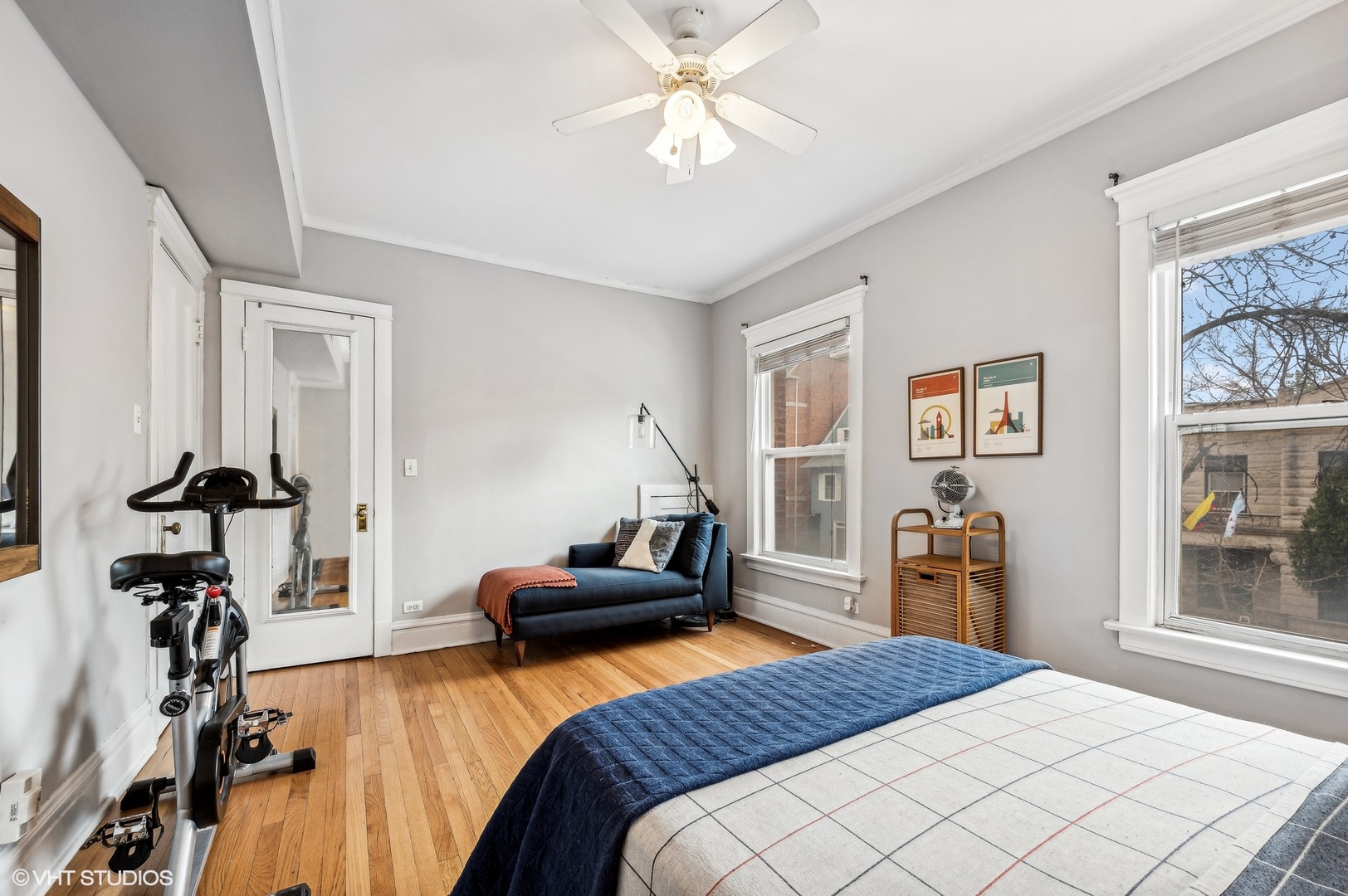 725 West Buckingham Place, Unit 2 Chicago, IL 60657 - Photo 13 of 15 a bedroom with a bed and a chandelier