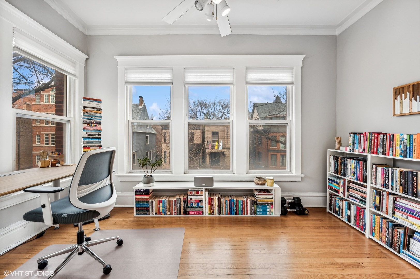 725 West Buckingham Place, Unit 2 Chicago, IL 60657 - Photo 4 of 15 a view of a workspace with furniture and a large window