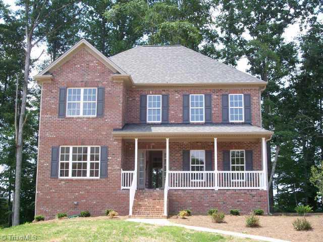 110 Peppertree Road Clemmons, NC 27012 - Photo 1 of 9 Exterior Front. Beautiful Brick Facade with Inviting Front Porch in Peppertree