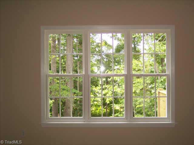 110 Peppertree Road Clemmons, NC 27012 - Photo 5 of 9 Other. Den, Kitchen, Breakfast Room and Deck overlooks beautiful Wooded Backyard