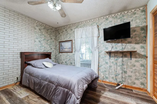 a room with a dresser and a mirror