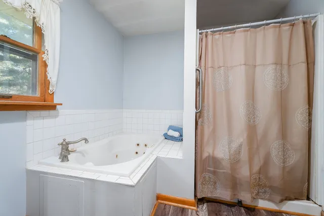 a view of parking garage with cars