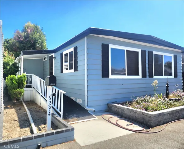a front view of a house with porch