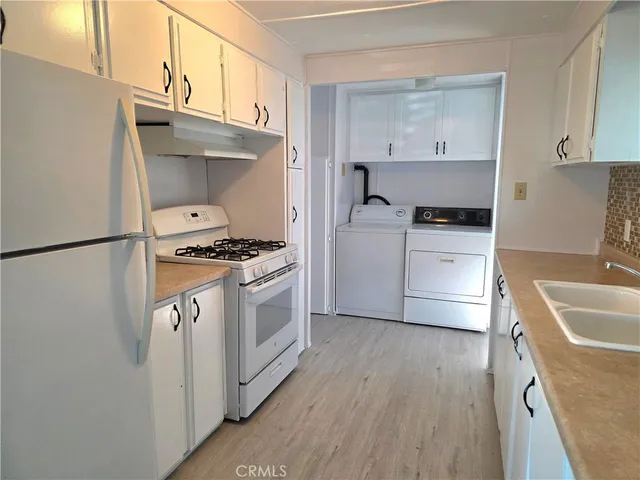 a view of a dining room with furniture and window
