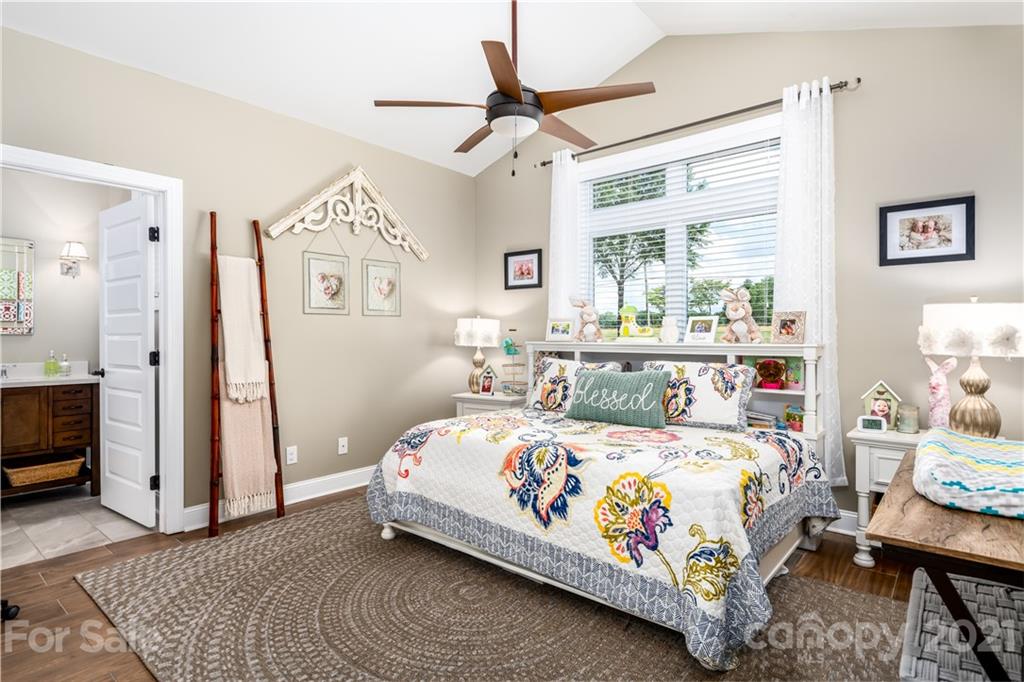 2515 Sandy Ford Road Newton, NC 28658 - Photo 21 of 38 a bedroom with a bed and a window