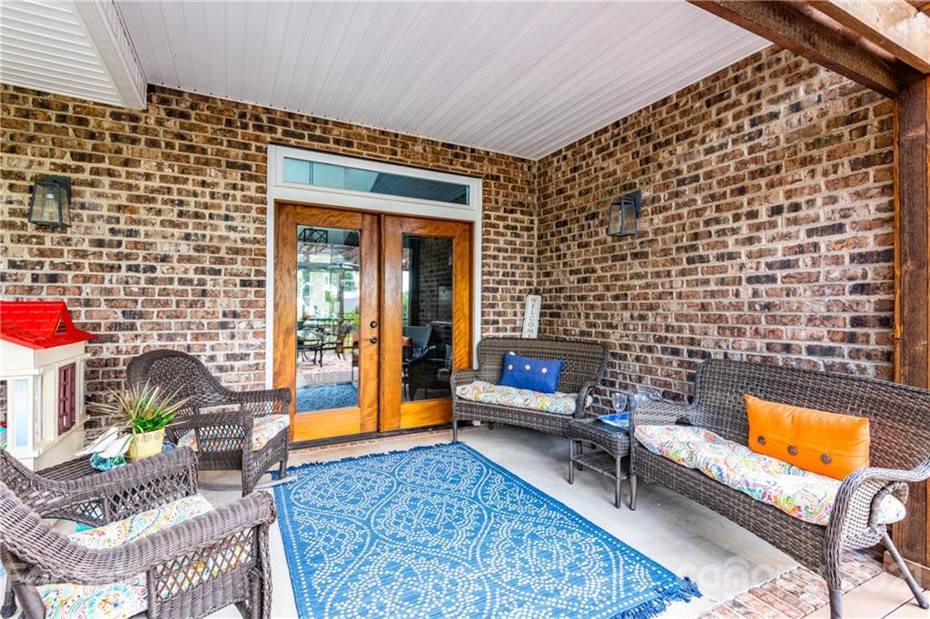 2515 Sandy Ford Road Newton, NC 28658 - Photo 30 of 38 a backyard of a house with sofas