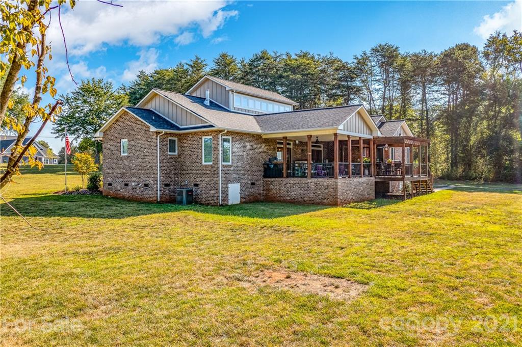 2515 Sandy Ford Road Newton, NC 28658 - Photo 34 of 38 front view of a house with a yard