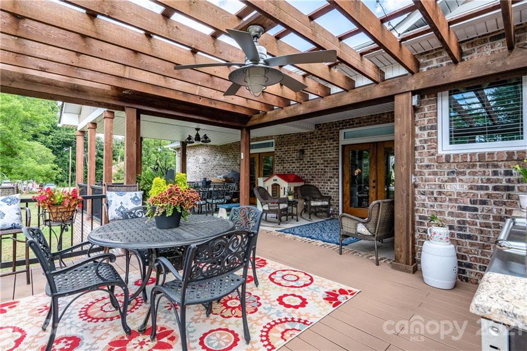 2515 Sandy Ford Road Newton, NC 28658 - Photo 35 of 38 a view of an outside dining space with furniture