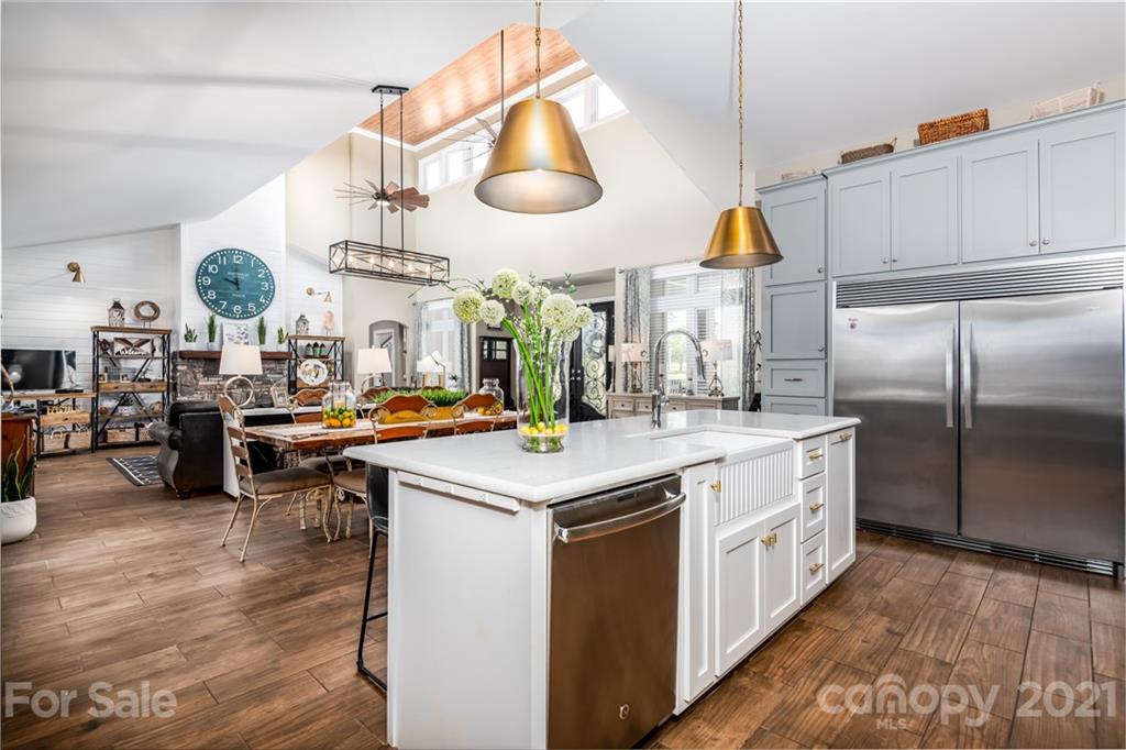 2515 Sandy Ford Road Newton, NC 28658 - Photo 6 of 38 a kitchen with a sink a counter space and stainless steel appliances