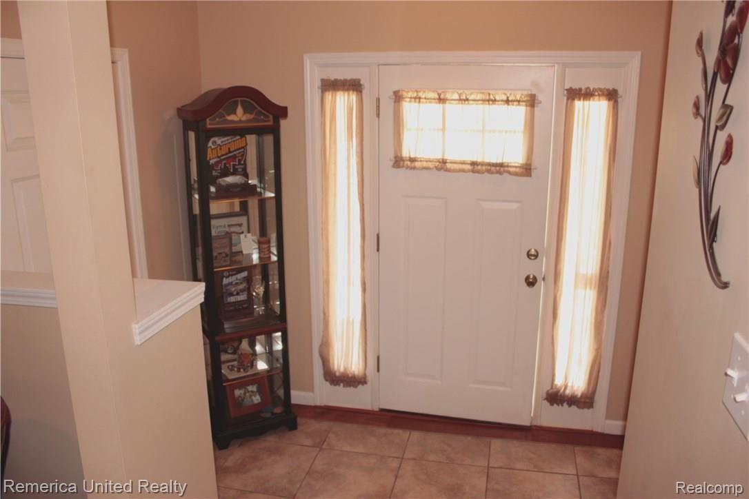 2435 Gibson Road Grand Blanc, MI 48439 - Photo 4 of 25 Large foyer with ceramic floor