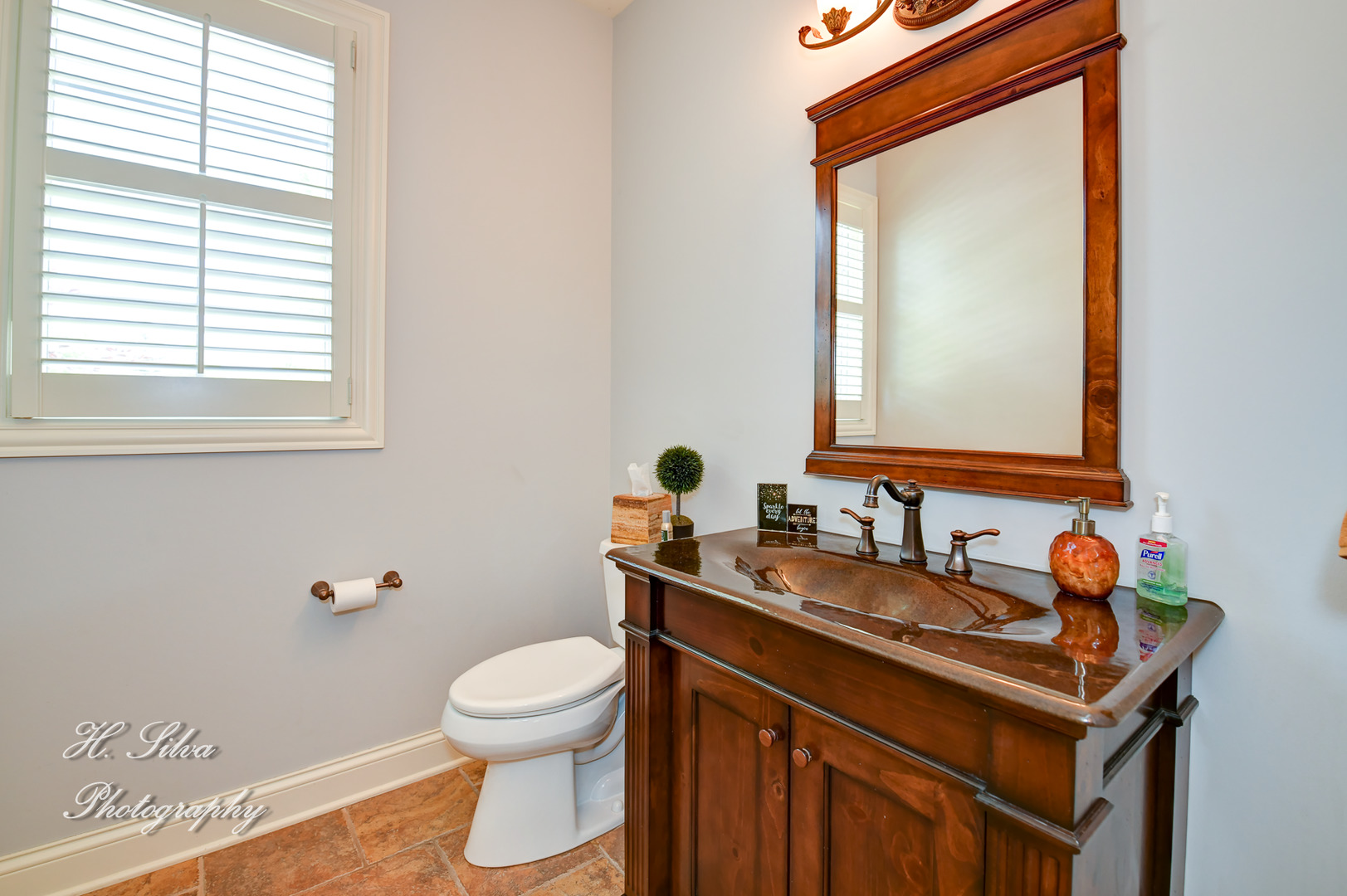11 Covington Court Algonquin, IL 60102 - Photo 14 of 51 a bathroom with a toilet sink and mirror