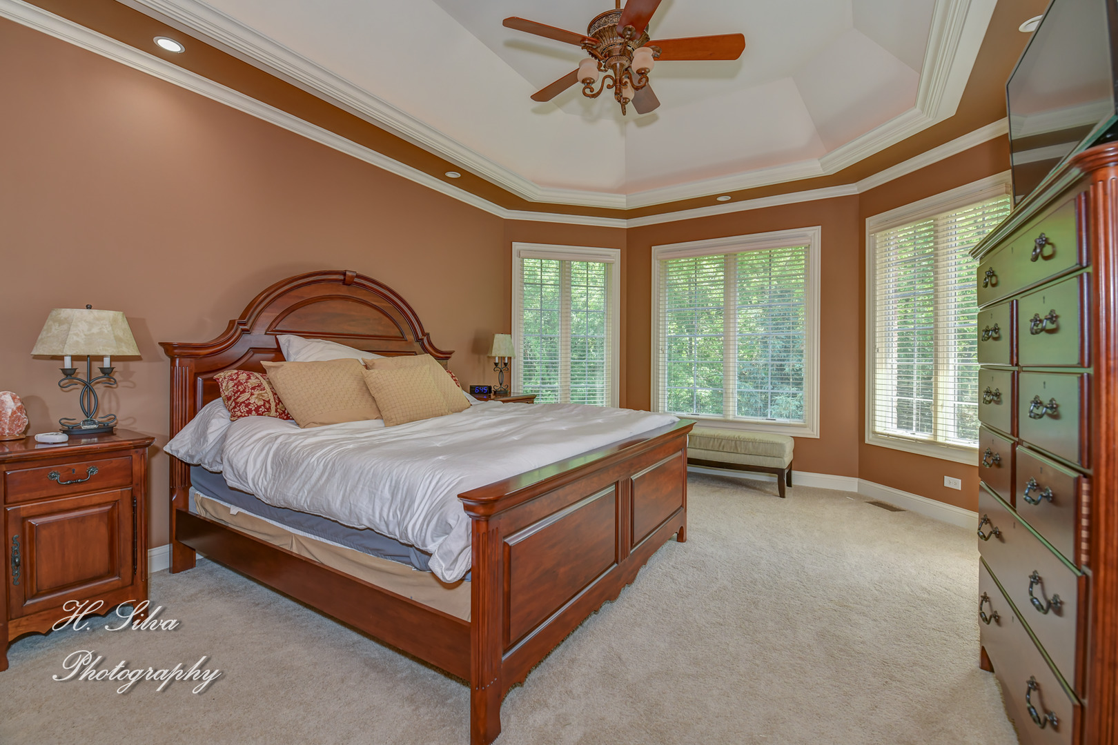 11 Covington Court Algonquin, IL 60102 - Photo 15 of 51 a bedroom with a large bed and a chandelier