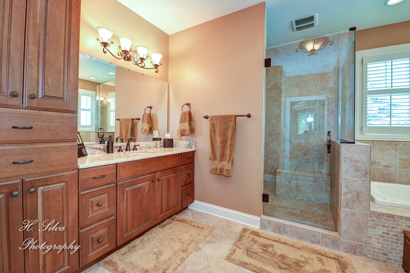11 Covington Court Algonquin, IL 60102 - Photo 16 of 51 a spacious bathroom with a double vanity sink a mirror and a shower
