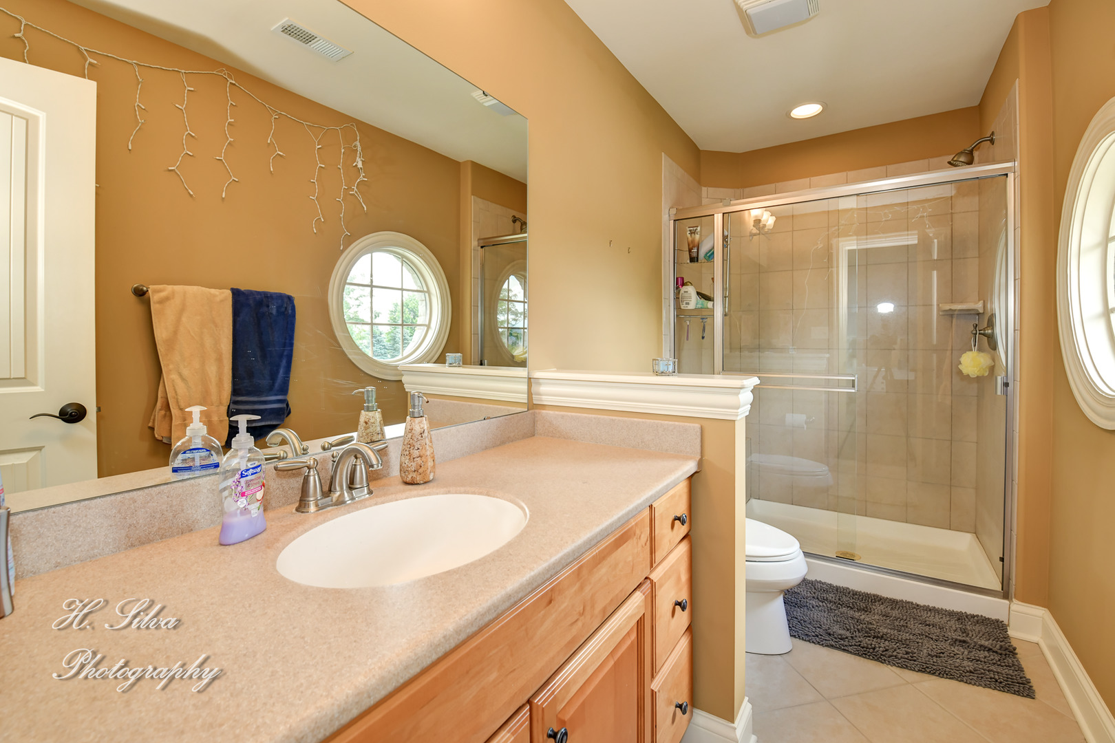 11 Covington Court Algonquin, IL 60102 - Photo 24 of 51 a bathroom with a sink and a mirror