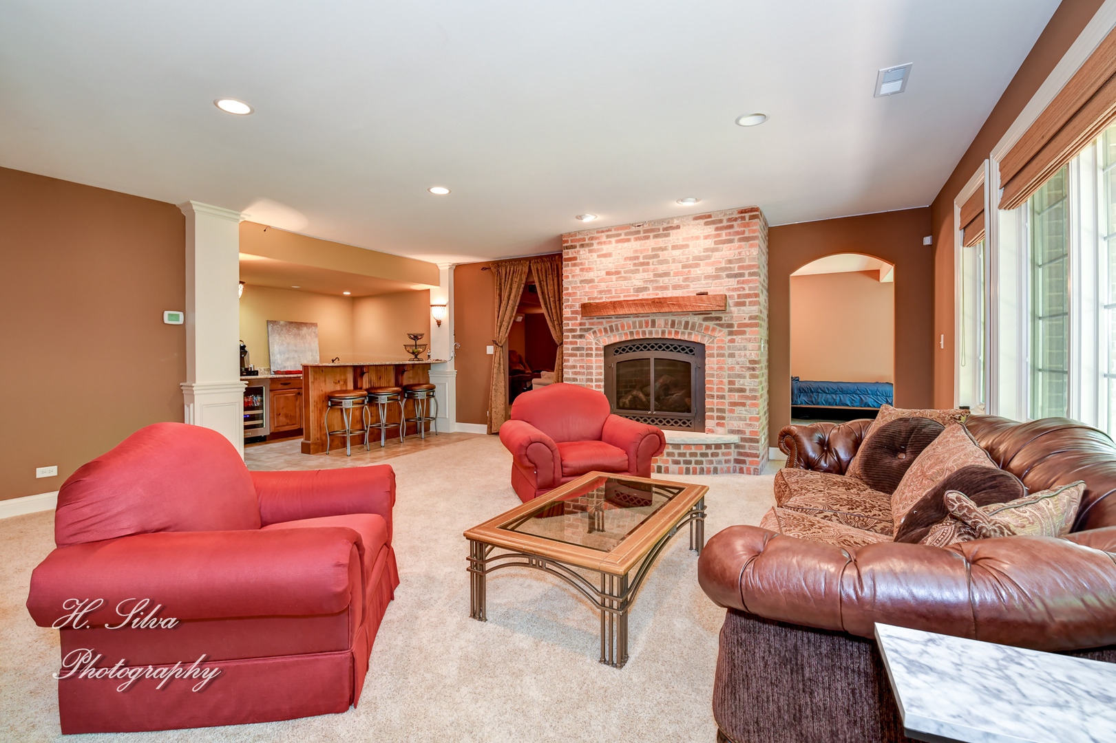 11 Covington Court Algonquin, IL 60102 - Photo 27 of 51 a living room with furniture or kitchen and a fireplace