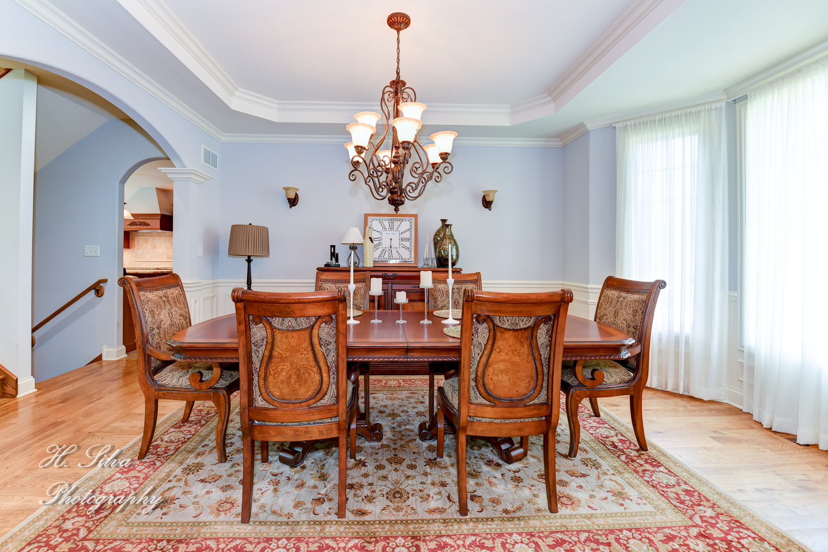 11 Covington Court Algonquin, IL 60102 - Photo 3 of 51 a dining room with furniture a chandelier and wooden floor
