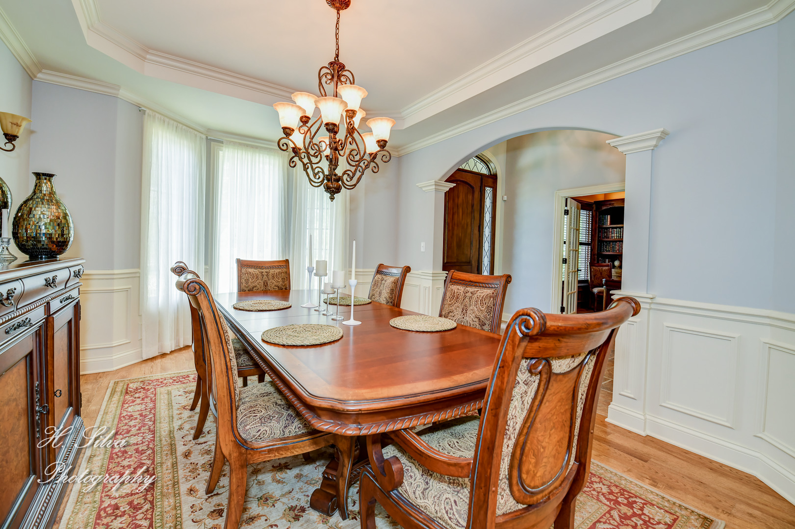 11 Covington Court Algonquin, IL 60102 - Photo 4 of 51 a view of a dining room with furniture and chandelier