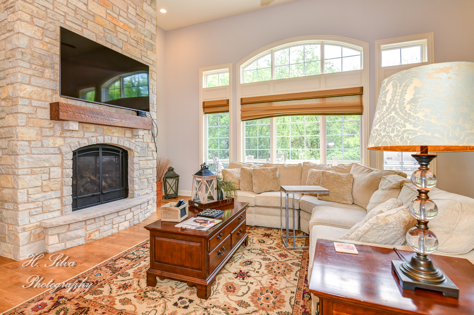 11 Covington Court Algonquin, IL 60102 - Photo 6 of 51 a living room with furniture a fireplace and a flat screen tv