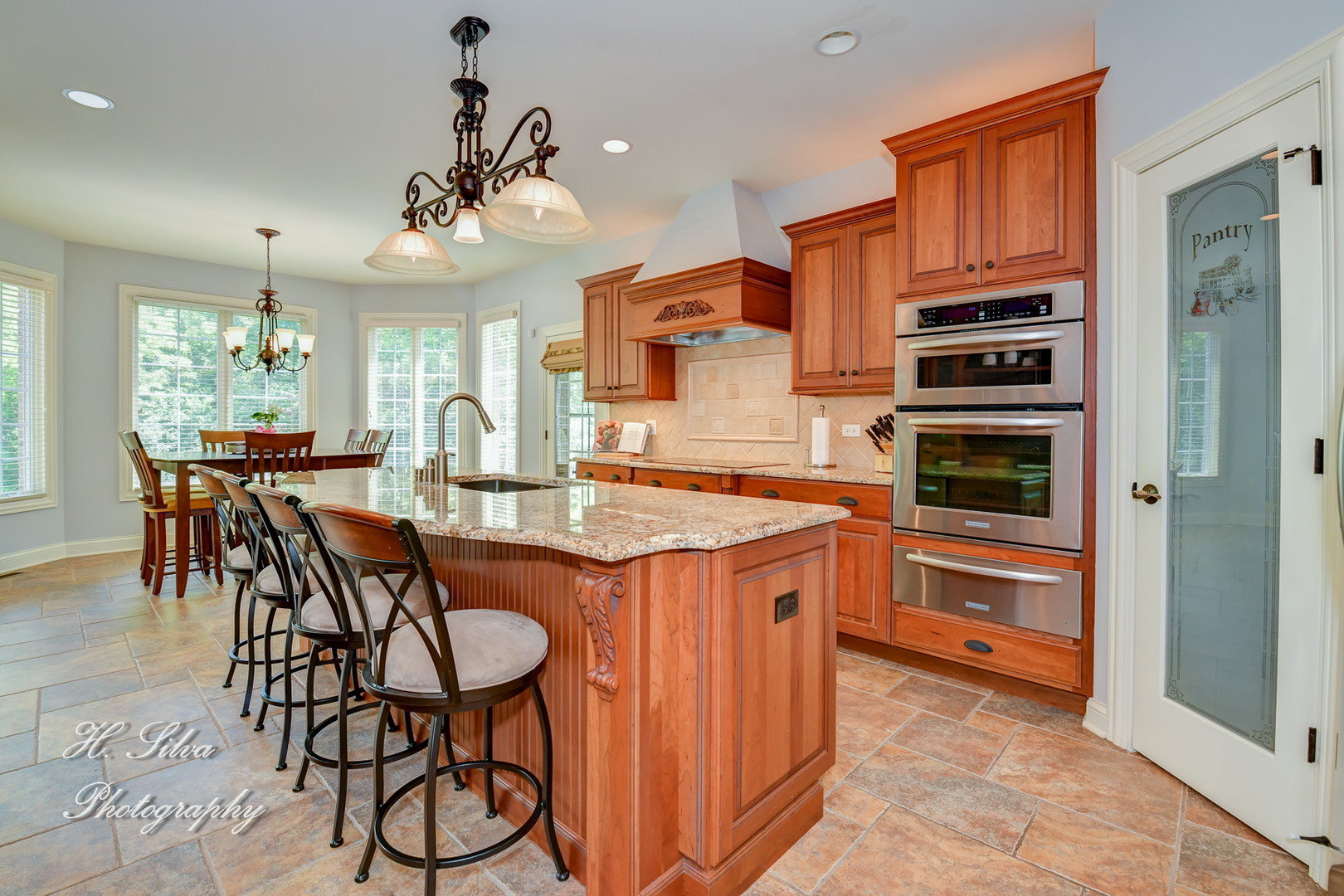 11 Covington Court Algonquin, IL 60102 - Photo 9 of 51 a kitchen with stainless steel appliances granite countertop a kitchen island a stove and a refrigerator