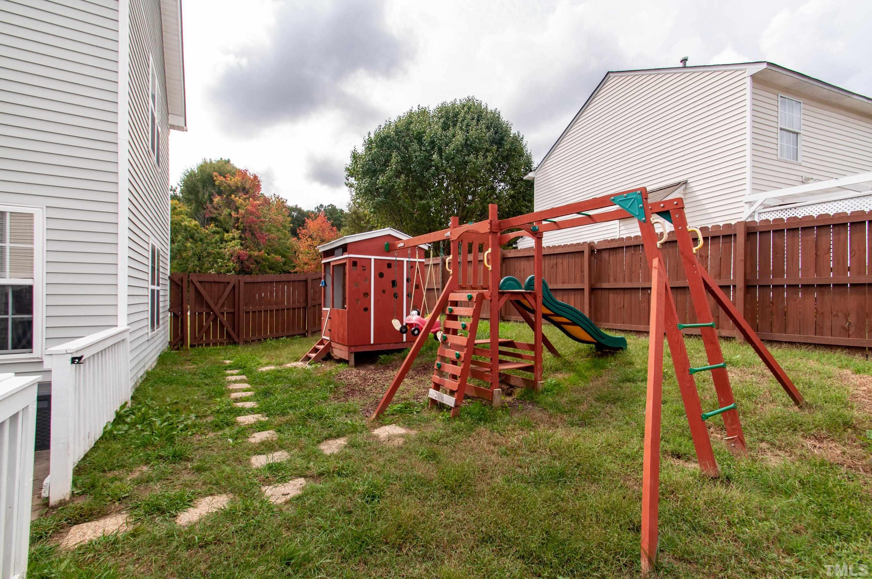 1532 Clover Ridge Court Raleigh, NC 27610 - Photo 18 of 19 Swing set does not convey