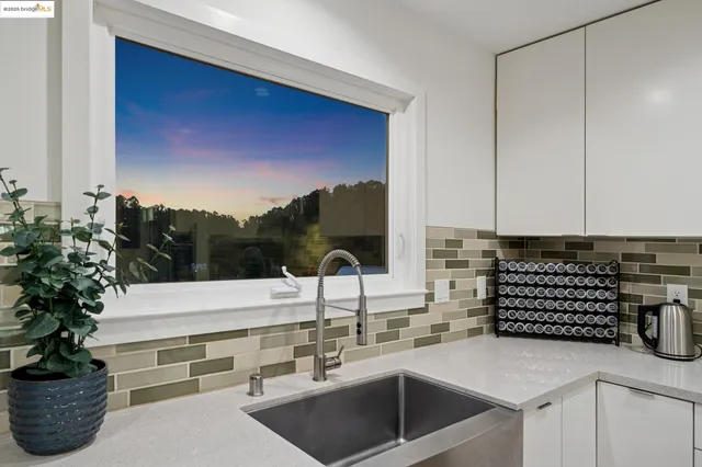 a view of a chairs and table in a terrace