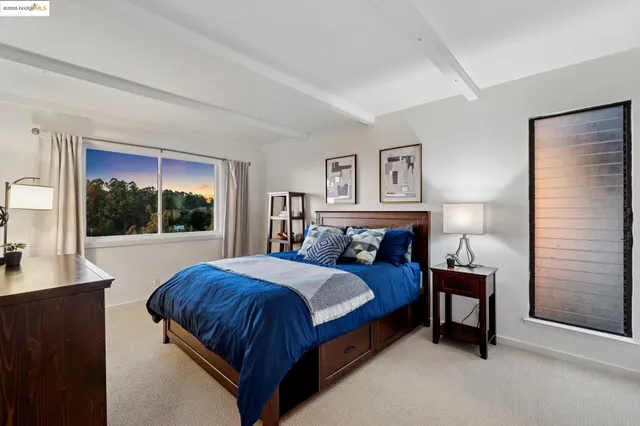 a bathroom with a sink toilet and mirror