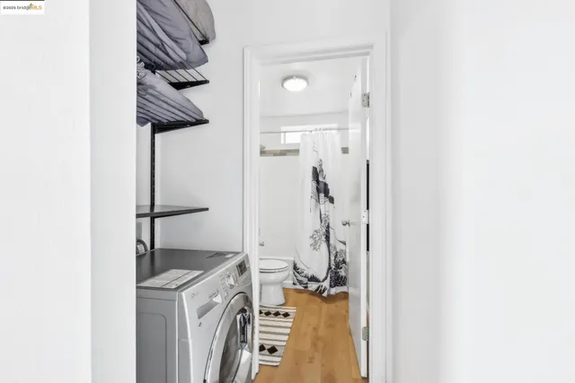 a front view of a residential apartment building with a yard