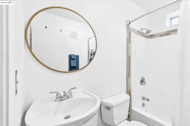 a view of a house with a swimming pool and sitting area