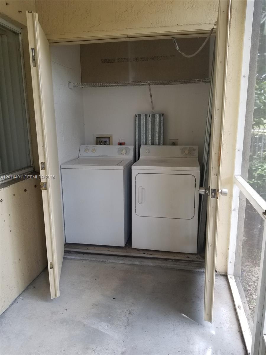 470 South Park Road, Unit 7110 Hollywood, FL 33021 - Photo 12 of 18 a utility room with dryer and washer