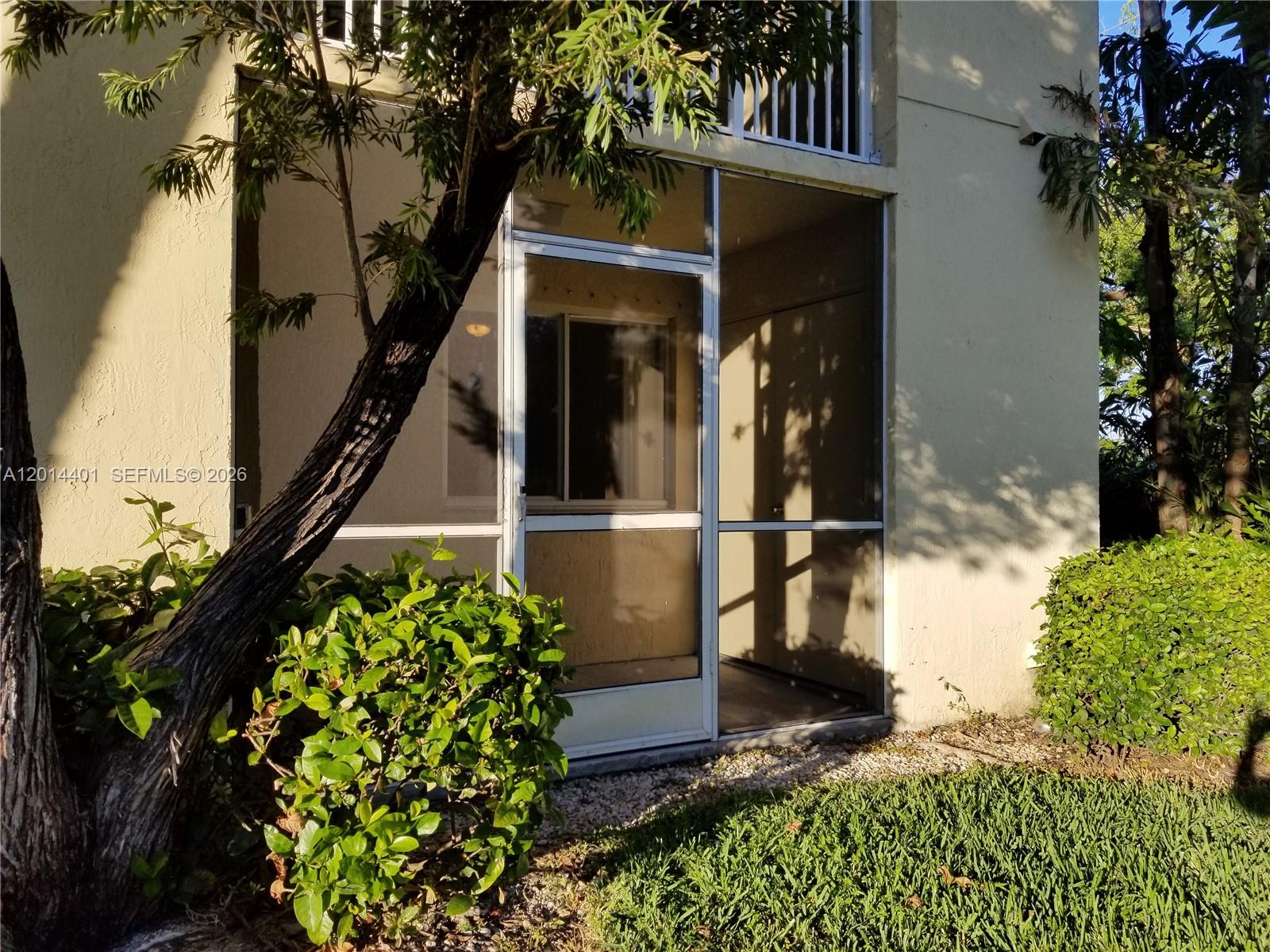 470 South Park Road, Unit 7110 Hollywood, FL 33021 - Photo 13 of 18 a front view of a house with a yard