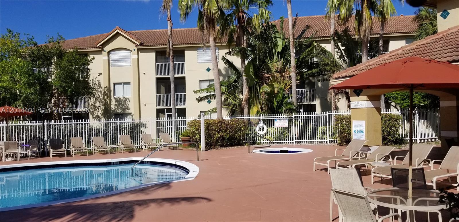 470 South Park Road, Unit 7110 Hollywood, FL 33021 - Photo 15 of 18 a view of a house with backyard and sitting area
