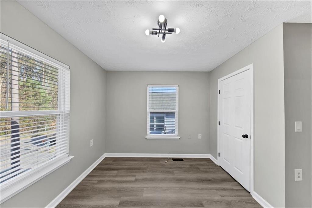 2478 Verbena Circle Northwest Atlanta, GA 30314 - Photo 15 of 42 a view of an empty room with a window