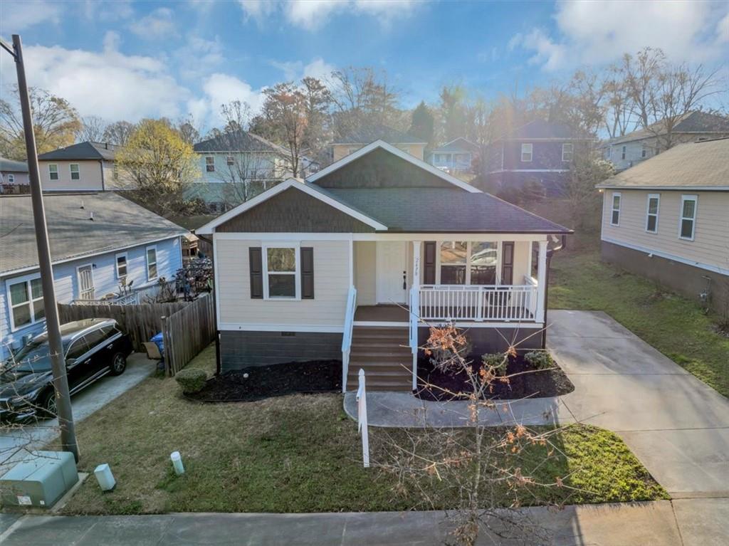 2478 Verbena Circle Northwest Atlanta, GA 30314 - Photo 35 of 42 a front view of a house with garden