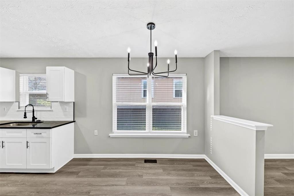 2478 Verbena Circle Northwest Atlanta, GA 30314 - Photo 8 of 42 a view of a kitchen cabinets and a window