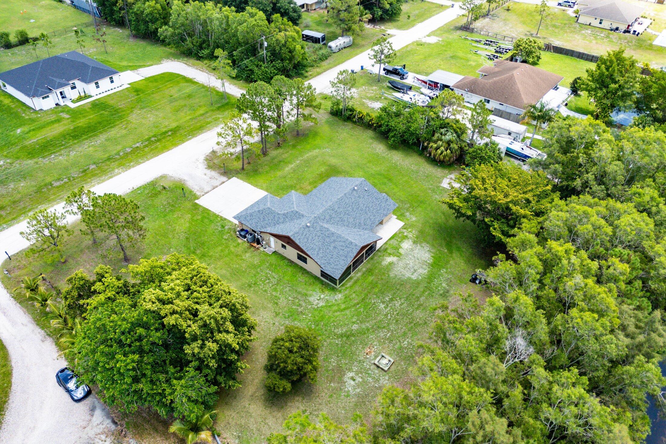 18142 43rd Road North Loxahatchee, FL 33470 - Photo 40 of 42 a view of a garden