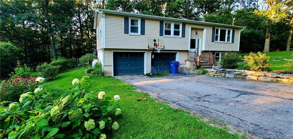 73 Turner Road Montville, CT 06370 - Photo 1 of 1 a front view of a house with a yard and porch