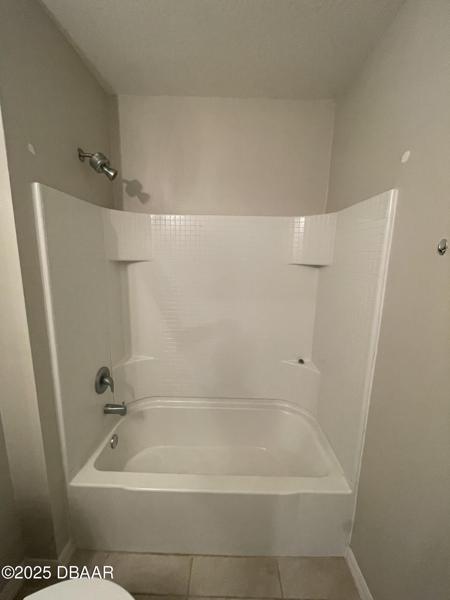 5343 Sandpine Haven Lane Port Orange, FL 32128 - Photo 14 of 44 a bathroom with a bathtub