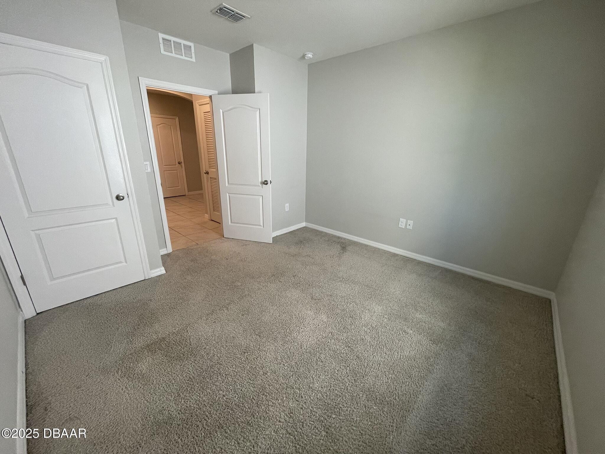 5343 Sandpine Haven Lane Port Orange, FL 32128 - Photo 19 of 44 a view of an empty room