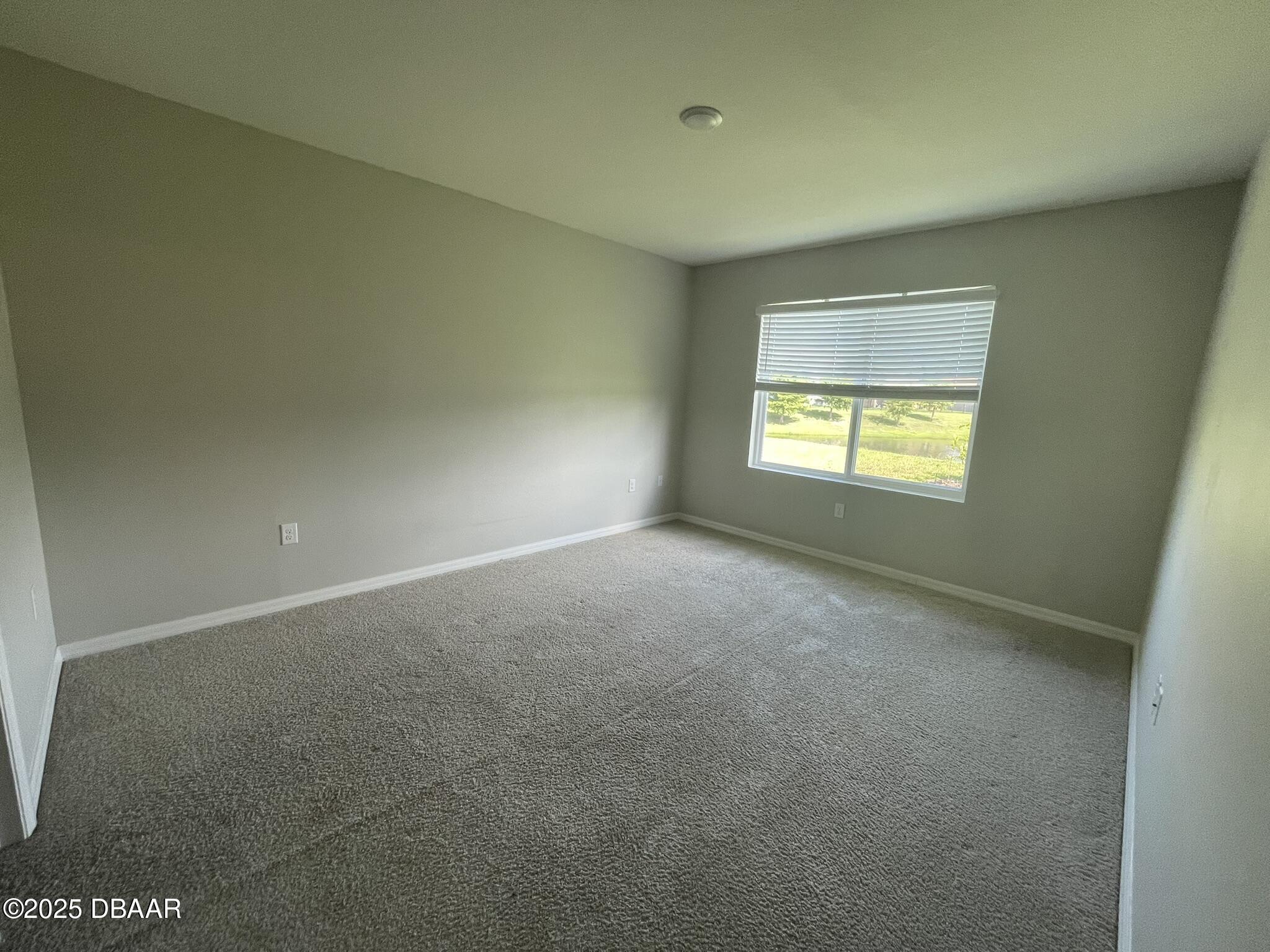 5343 Sandpine Haven Lane Port Orange, FL 32128 - Photo 26 of 44 a view of an empty room with a window