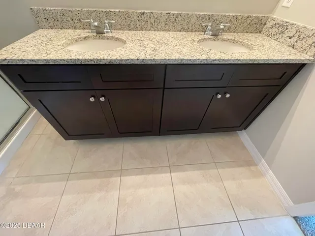 a view of a chairs and table on the patio