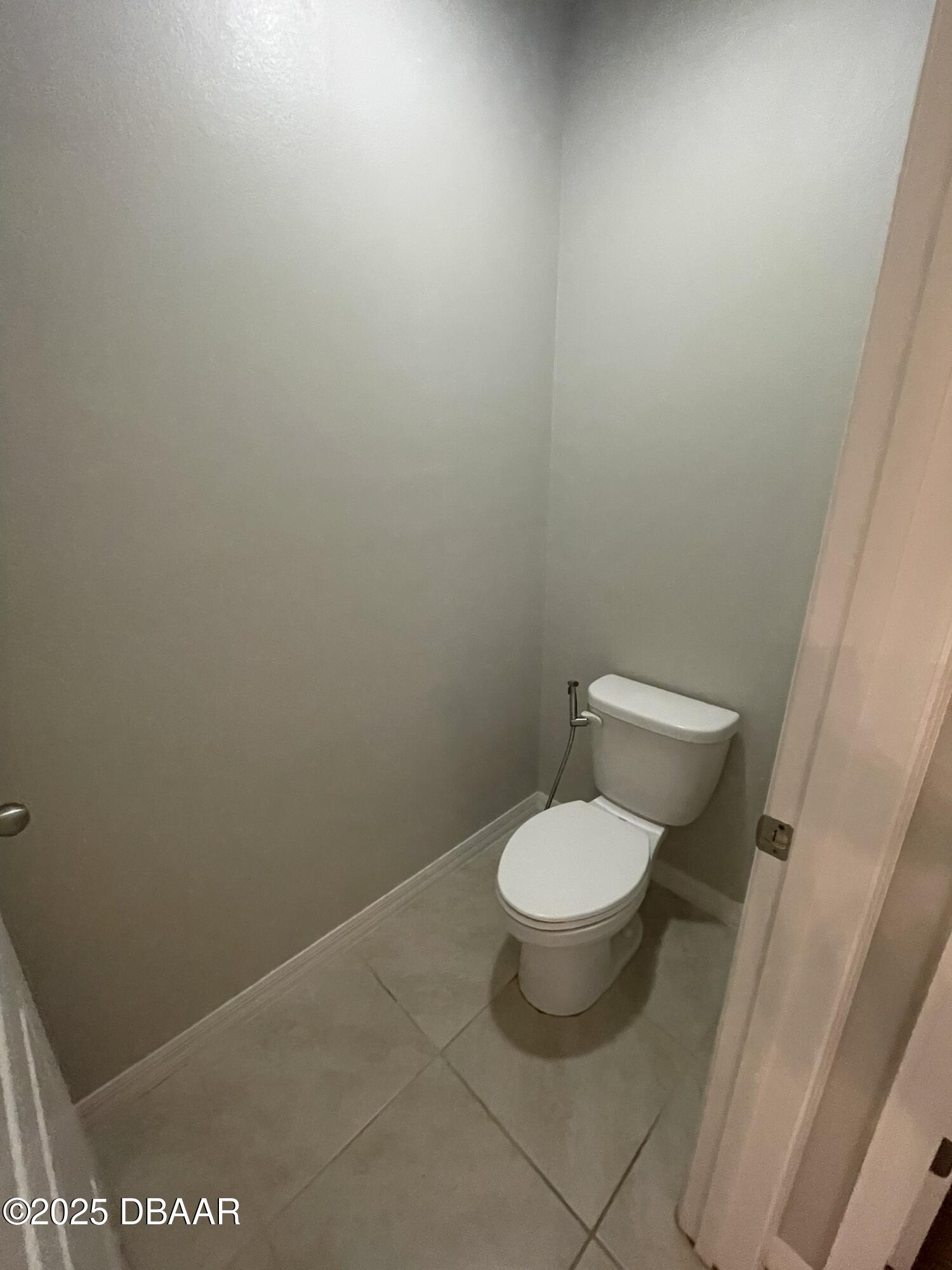 5343 Sandpine Haven Lane Port Orange, FL 32128 - Photo 31 of 44 a white toilet sitting next to a shower