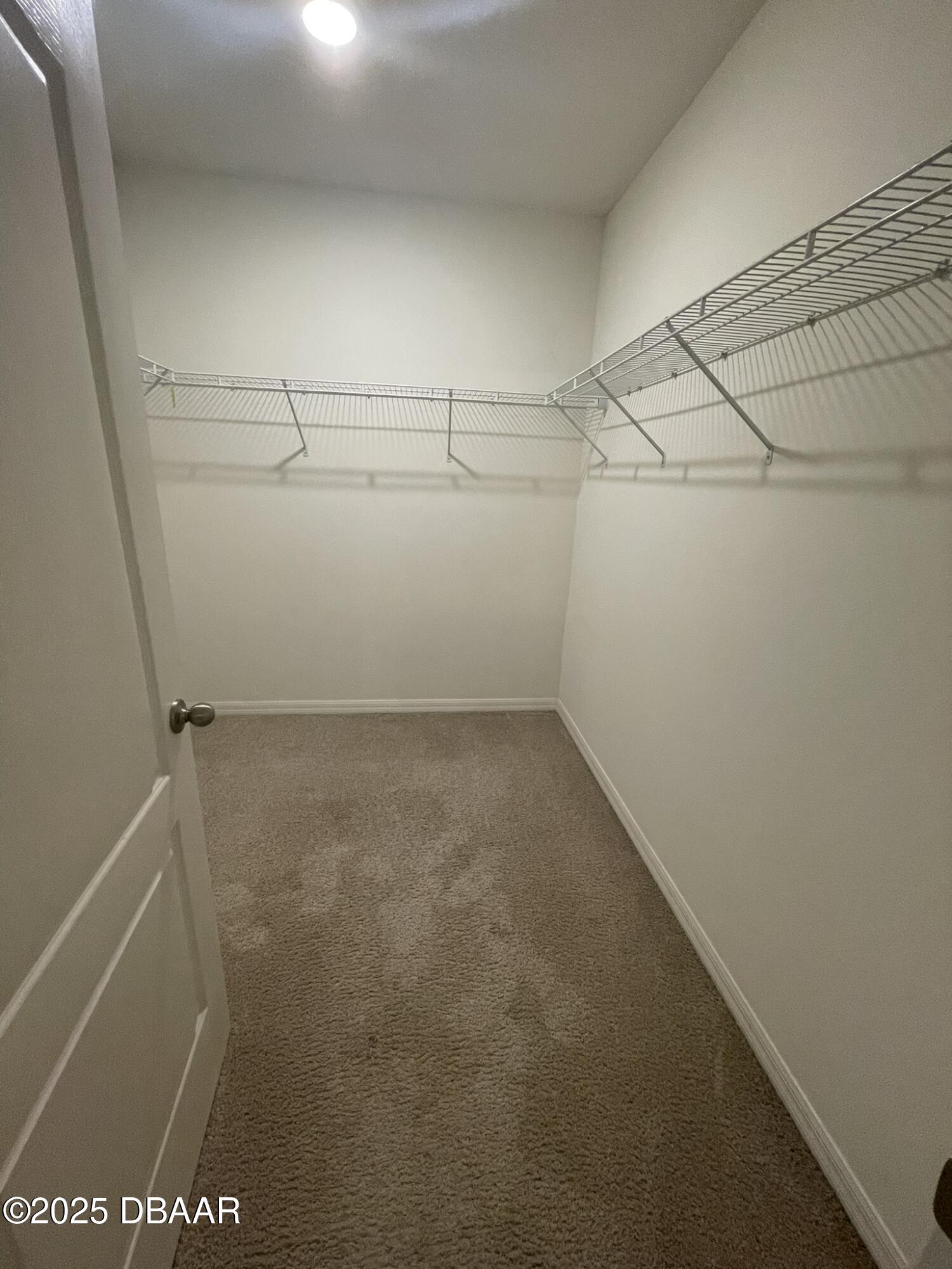 5343 Sandpine Haven Lane Port Orange, FL 32128 - Photo 33 of 44 a view of a room with racks on the wall