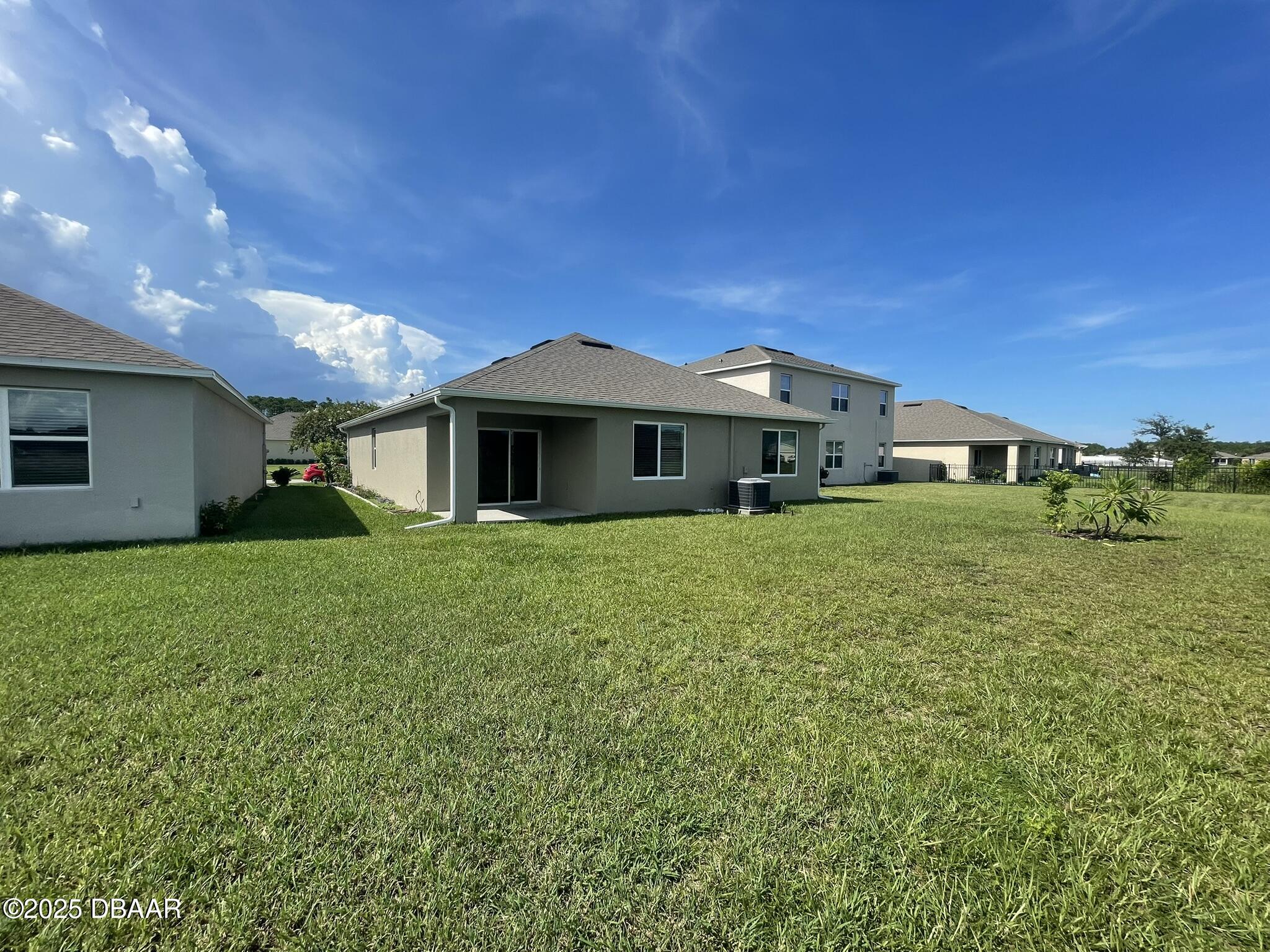 5343 Sandpine Haven Lane Port Orange, FL 32128 - Photo 38 of 44 a front view of a house with a garden