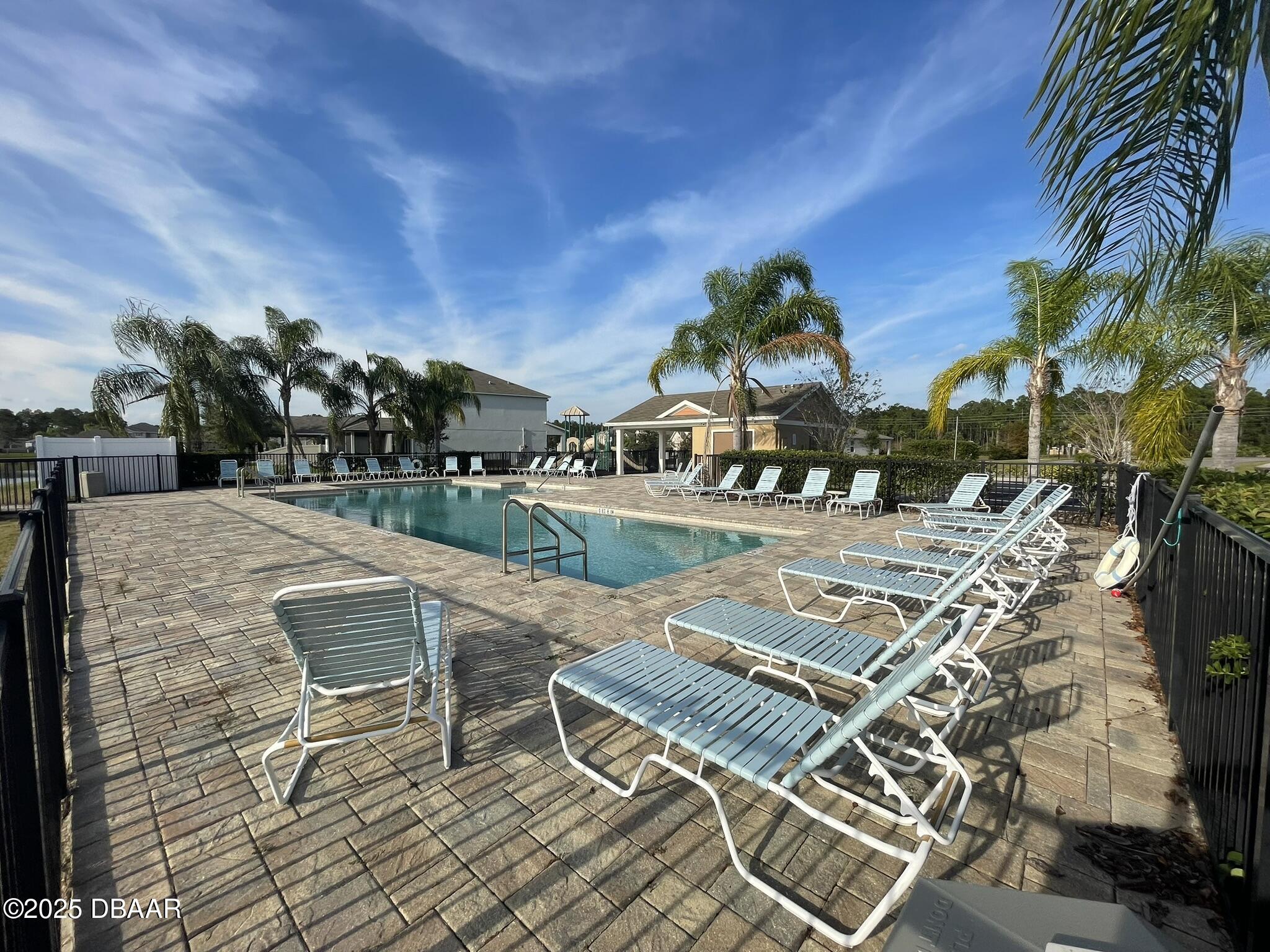 5343 Sandpine Haven Lane Port Orange, FL 32128 - Photo 44 of 44 a view of a chairs and table on the patio