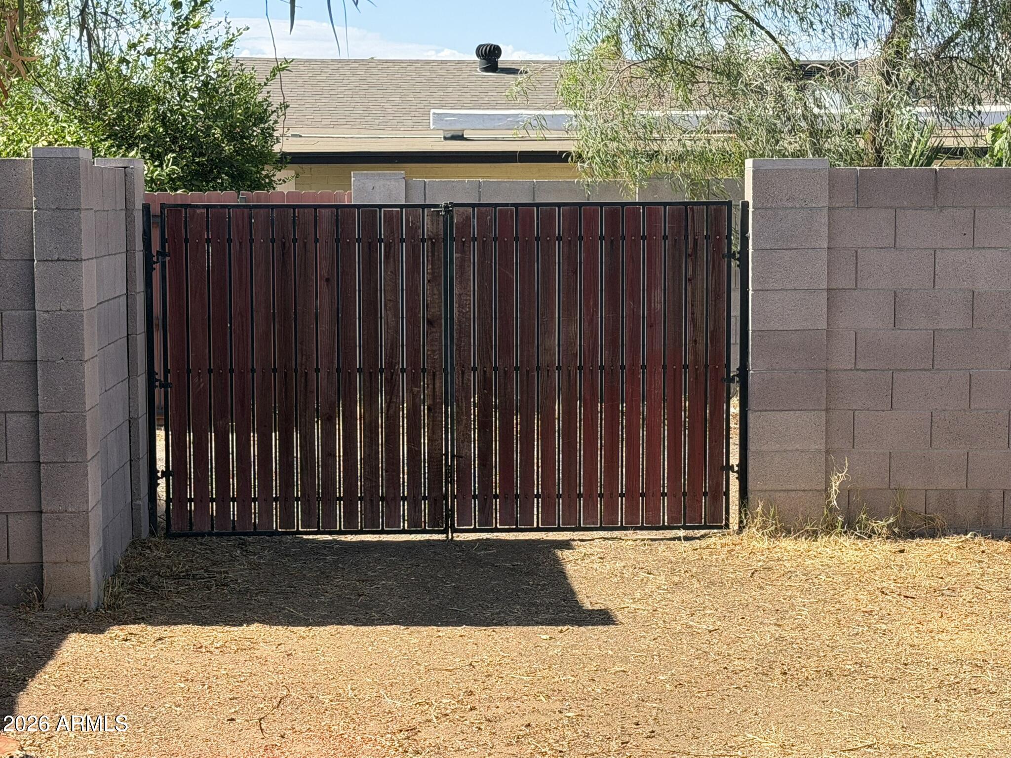 2302 East Nisbet Road Phoenix, AZ 85022 - Photo 19 of 22 a view of wooden fence